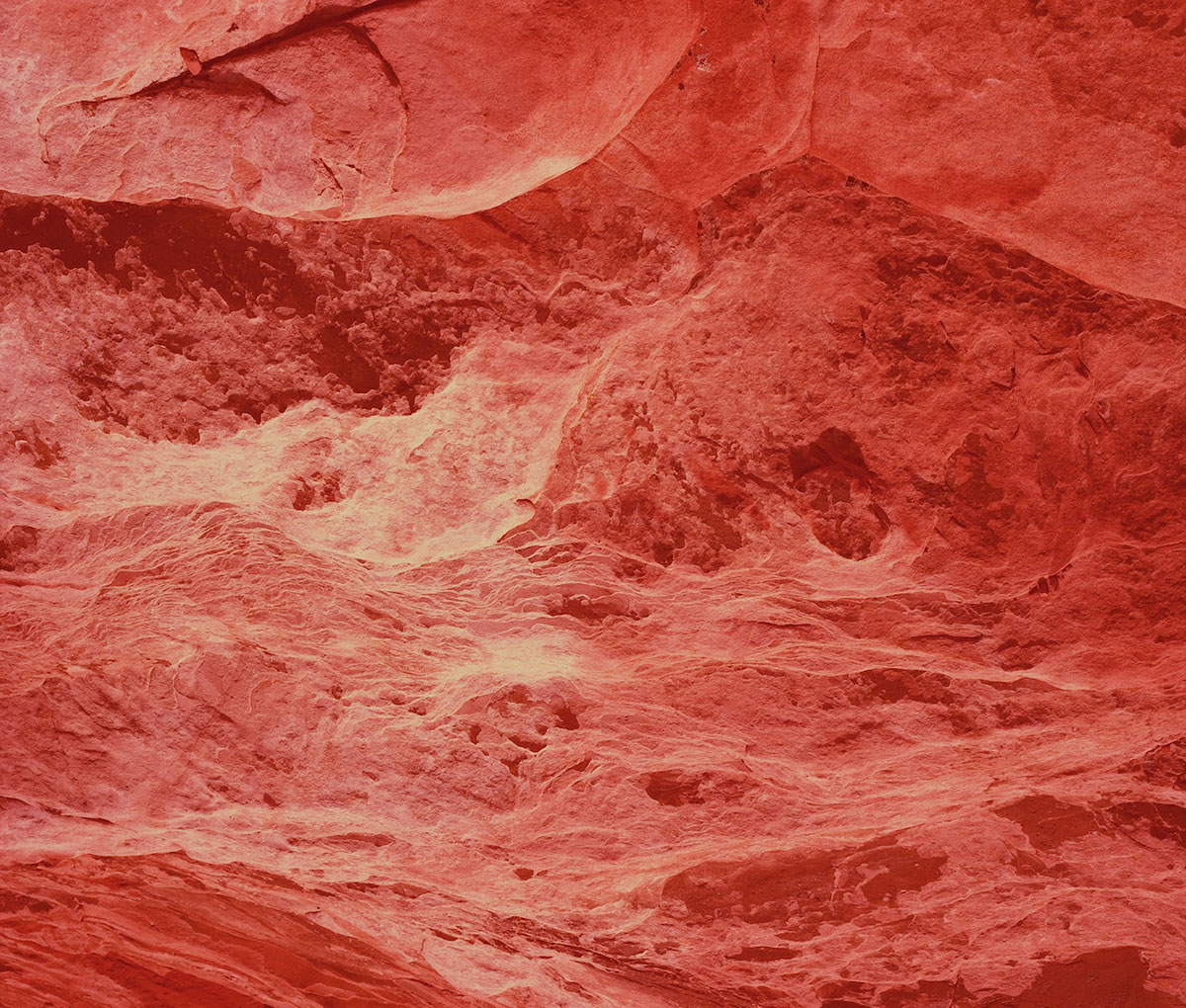David Benjamin Sherry, <em>Electric Crimson Mountain, Utah</em>, 2012. Traditional Color Darkroom Photograph, 30 × 40 inches. Courtesy of the artist and Salon 94, New York.